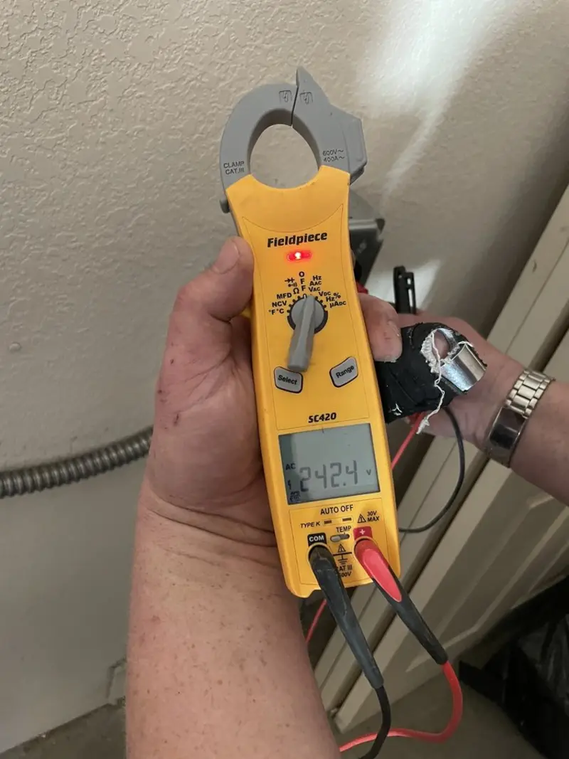 Voltage testing with clamp meter during Generator Installation in Pleasant Hills
